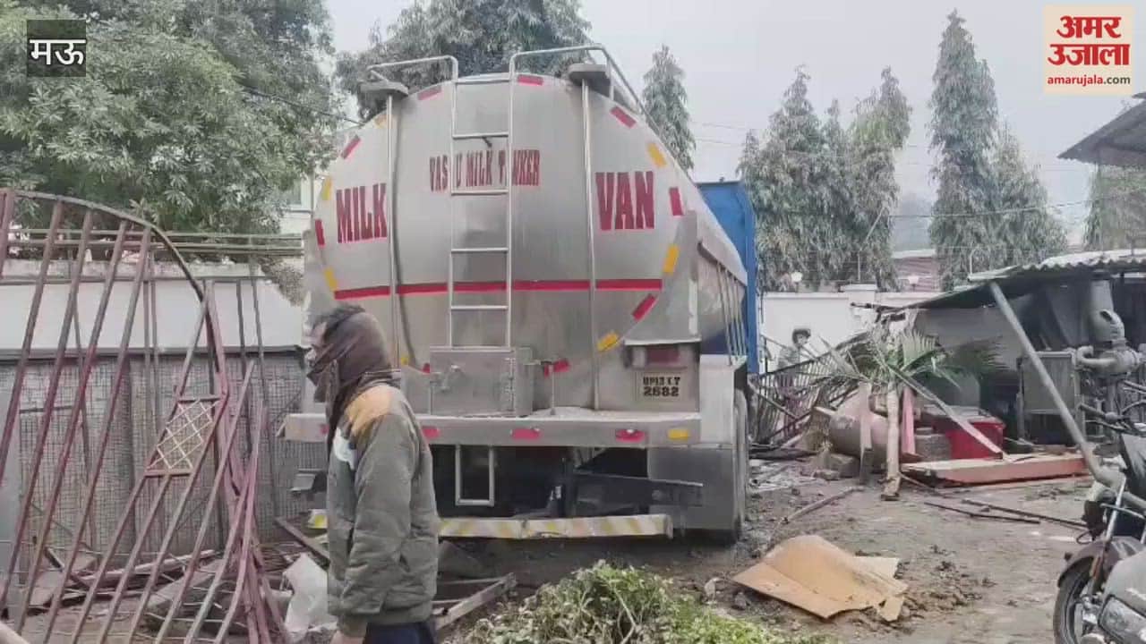 out-of-control milk delivery tanker crashed into motorcycle showroom wall damaging five bikes