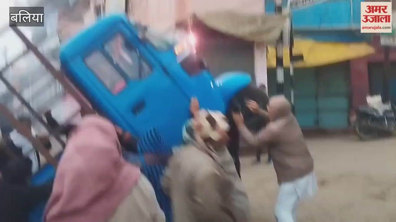 Vegetable-laden vehicle overturns at railway crossing driver rescued safely