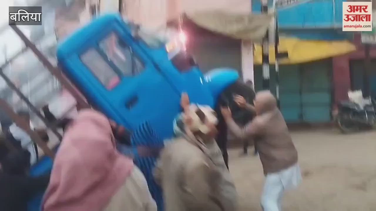 Vegetable-laden vehicle overturns at railway crossing driver rescued safely