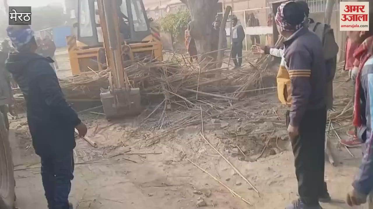 The town council removed illegal encroachments from the main road; a bulldozer was used in the operation.