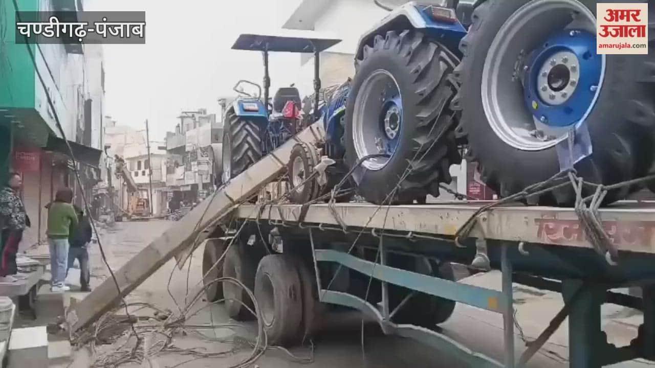 A trailer loaded with tractors collided with power lines in Moga, narrowly averting a major accident.