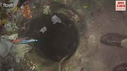 Rescue of cow that fell into open sewer on Ravidas Marg in Delhi continues