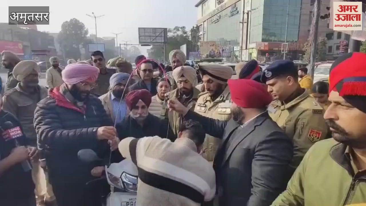 Safety angles installed on two wheelers to protect against China Door in Amritsar