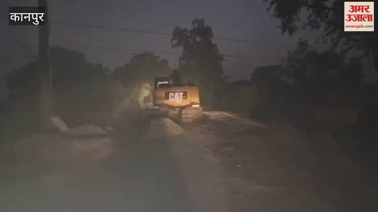 Excavator demolishing culvert without warning signs