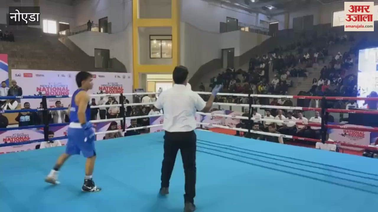 A boxer throwing a punch in the final match of the boxing championship