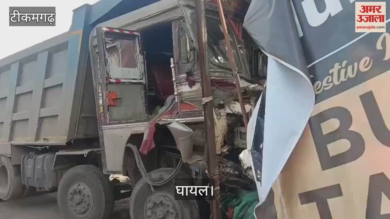 A dumper truck and a tractor-trailer collided; two people were injured.