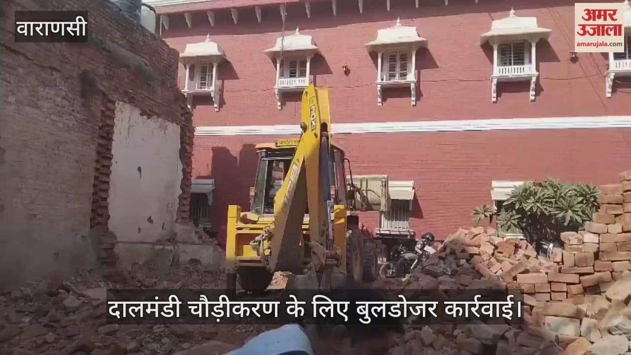 Demolition work continues in Dalmandi, and the debris is being removed with bulldozers