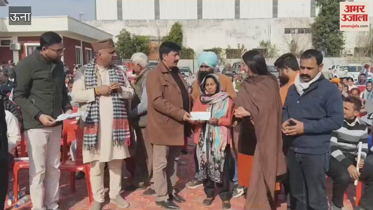 Una MLA Vivek Sharma distributes checks to disaster affected families of Kutlaihar on Lohri festival