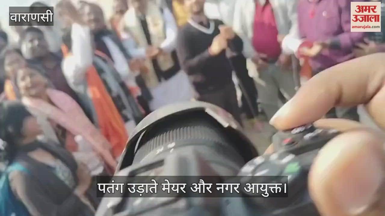 mayor and municipal commissioner flew kites and great time engaging in kite fighting in varanasi