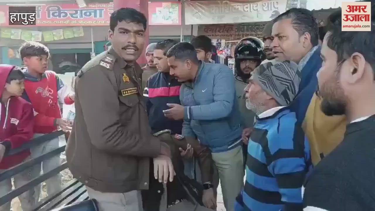 Rickshaw loaded with rice fell on a police officer standing on roadside with his bike