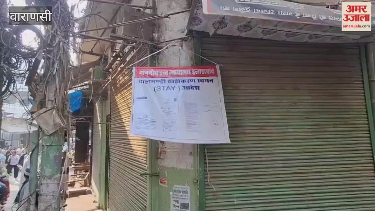 people hung posters outside their homes and shops in Dalmandi