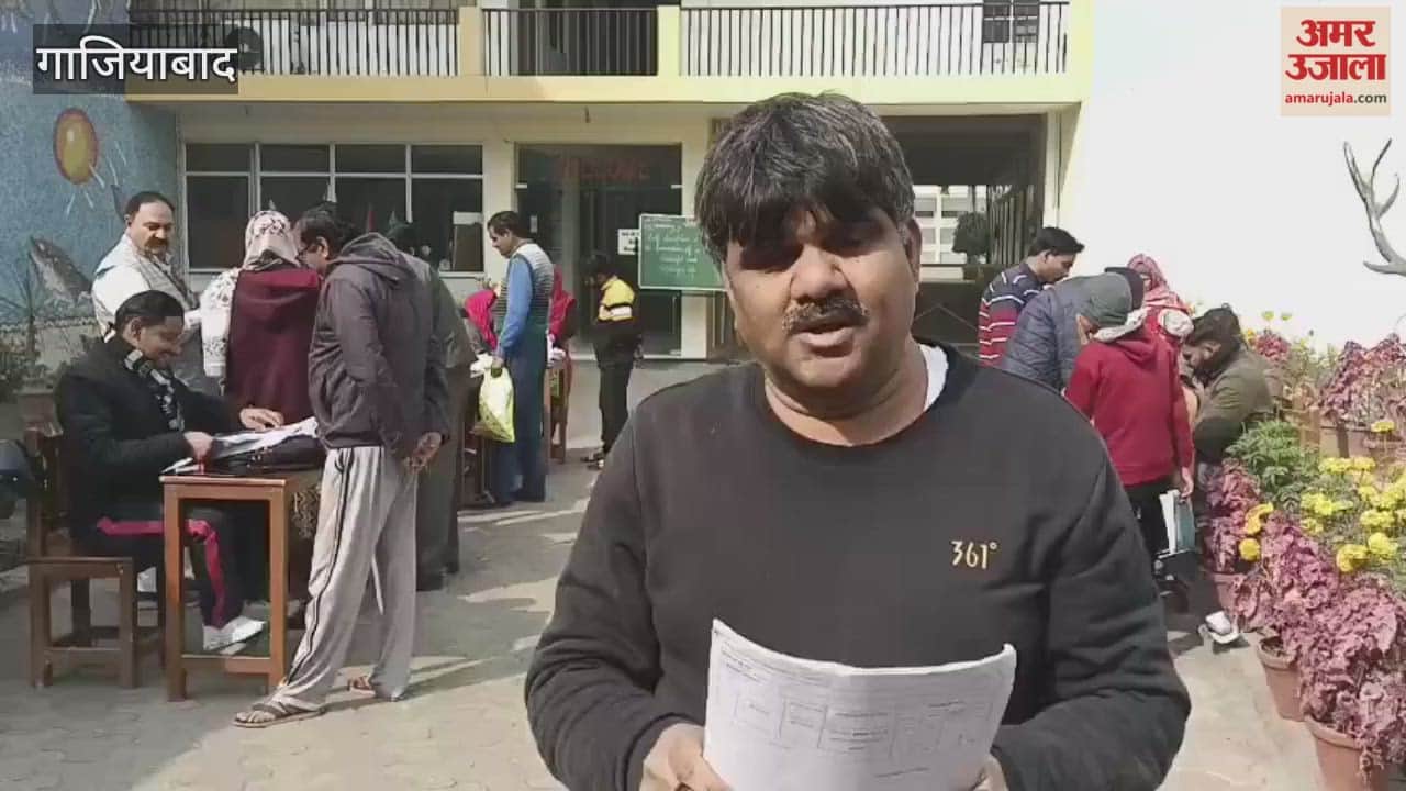 People describe the problems they are facing in getting their voter IDs made at the Muradnagar Ukhlarsi camp
