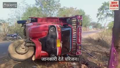 A woman riding a motorcycle was killed and her husband injured in a collision with a taxi.