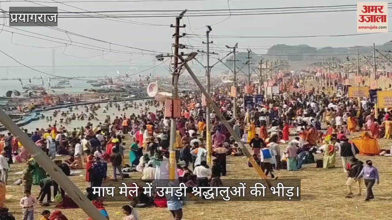 Crowds of devotees gathered at the Magh Mela, people arriving at the fair after the sun became hot.