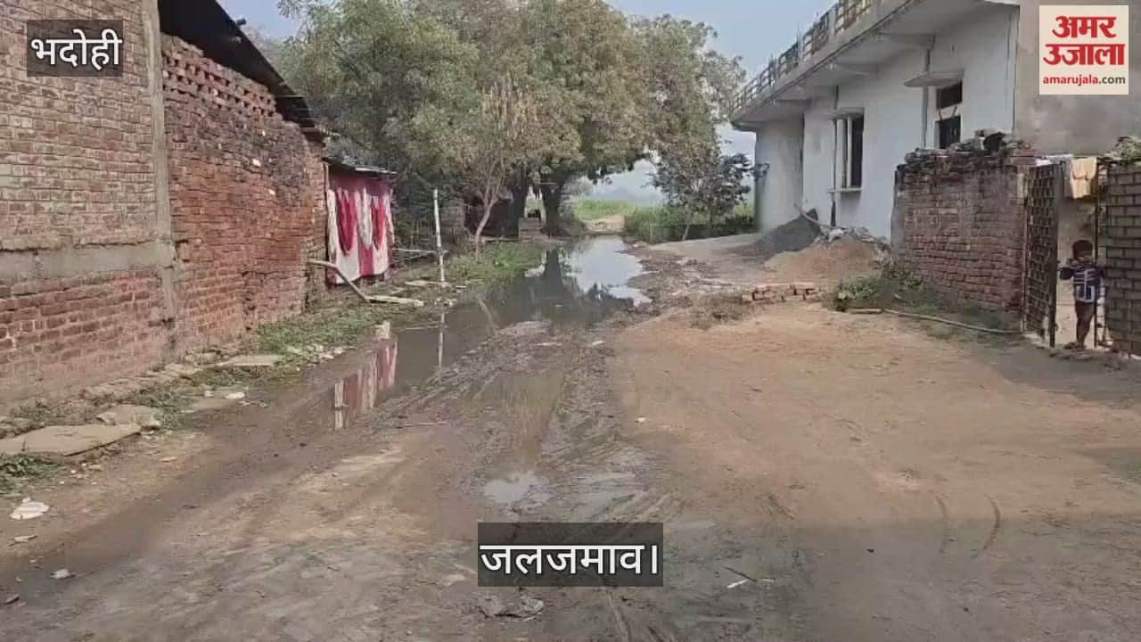 Waterlogging due to lack of drainage on the road connecting two settlements in Bhadohi.