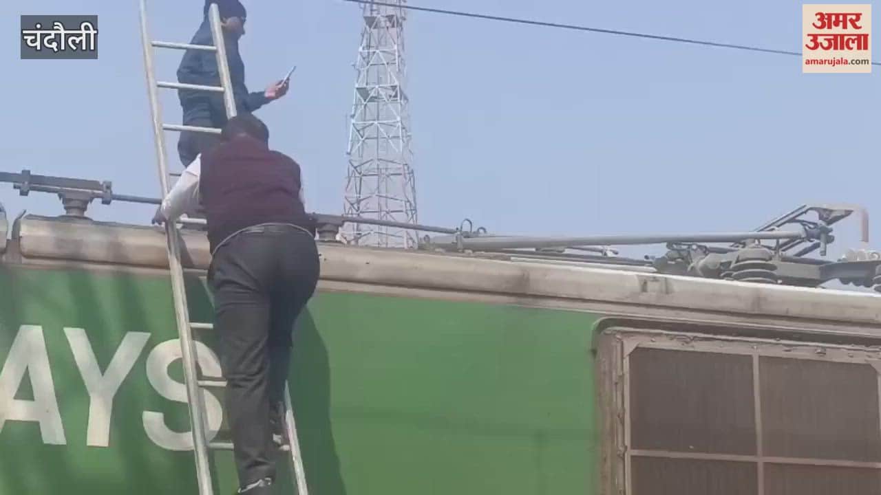 Jala Yard young man climbed onto engine of parked freight train