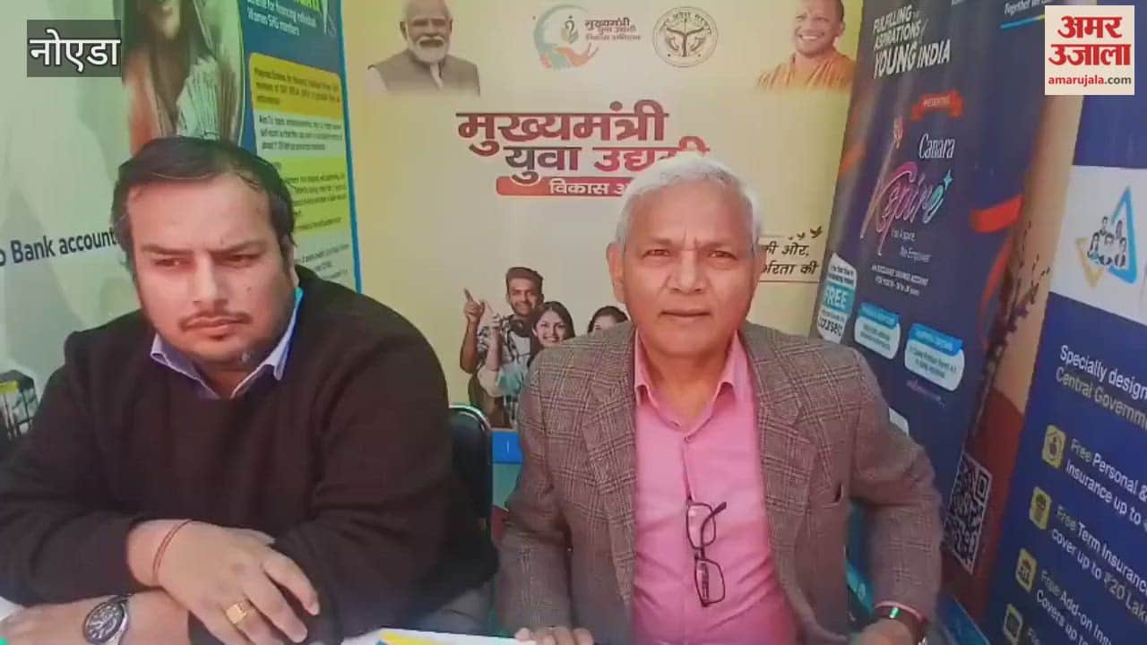 Information about banking schemes is being provided at the bank stall at the craft festival