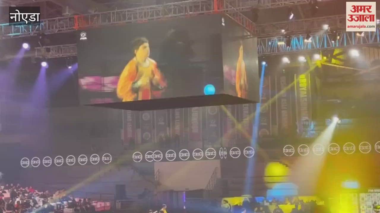 Wrestlers perform in Pro Wrestling League 2026 at Noida Stadium