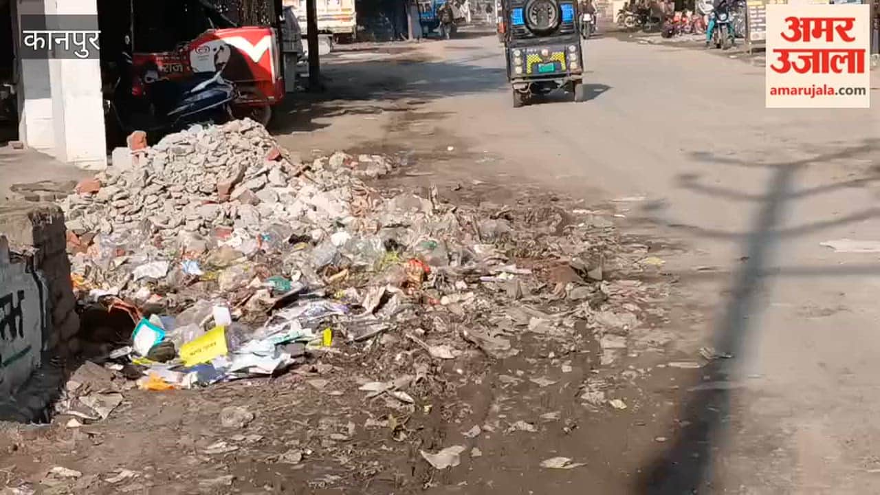 Kanpur: Dilapidated road and accumulated garbage near railway crossing