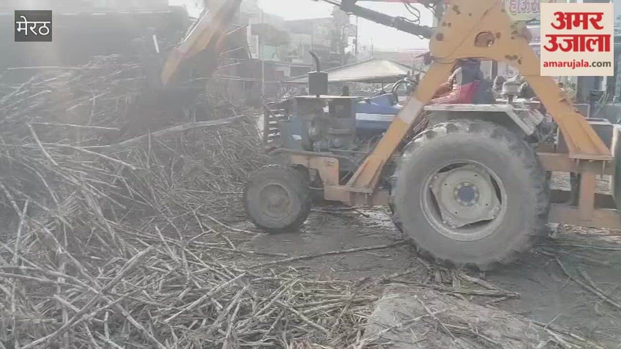 Meerut: An overloaded truck carrying sugarcane overturned onto an e-rickshaw; the driver jumped out to save his life
