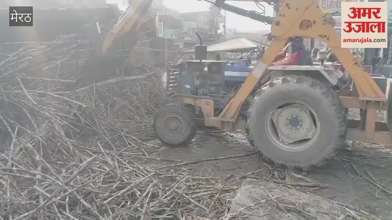 Meerut: An overloaded truck carrying sugarcane overturned onto an e-rickshaw; the driver jumped out to save his life