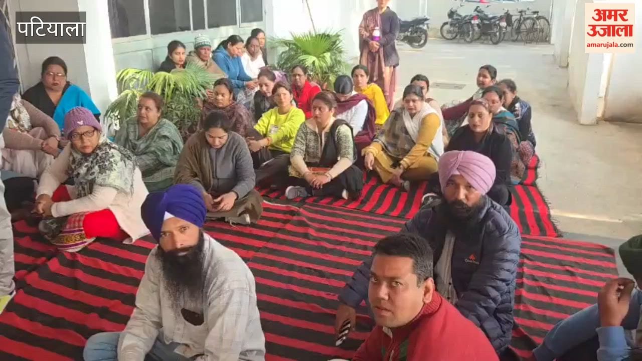 Employees protest in front of the Vice Chancellor's office at Punjabi University, Patiala.