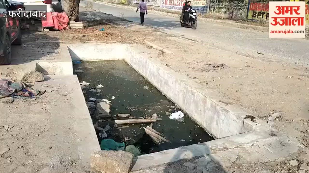 An open water tank on the service road leading to Sector 21 in Faridabad