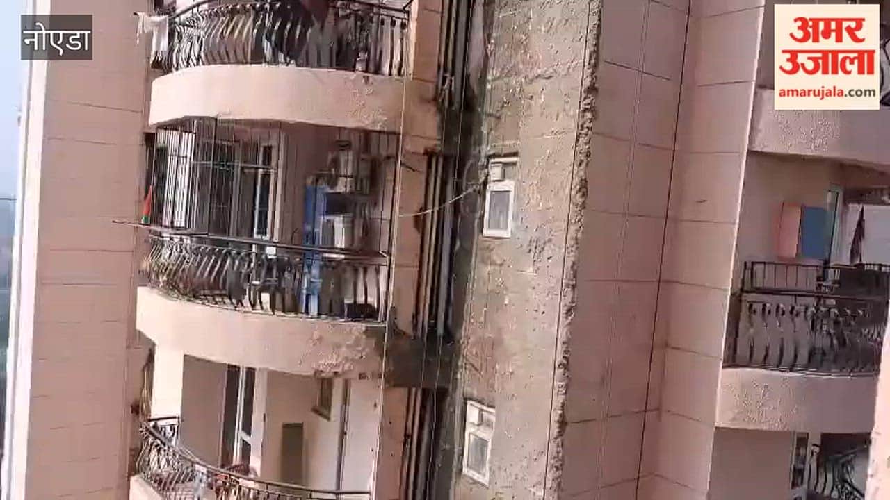 A worker narrowly escapes after a cradle wire snaps during a tower repair in Noida