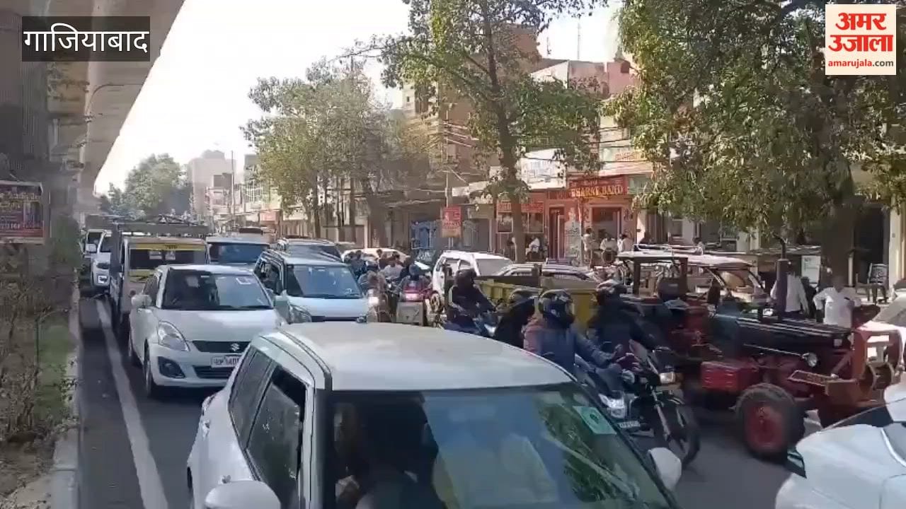 Farmers sit on protest outside Vishal Mega Mart in Modinagar