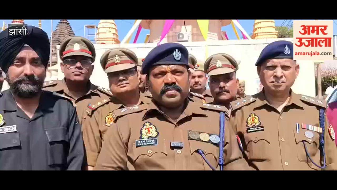 SSP BBGTS Murthy giving information about security arrangements for Shiv Barat in Jhansi.