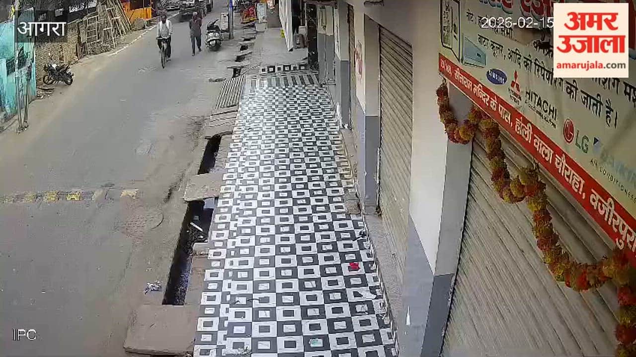 Tractor stuck in a pothole after road caved in Agra