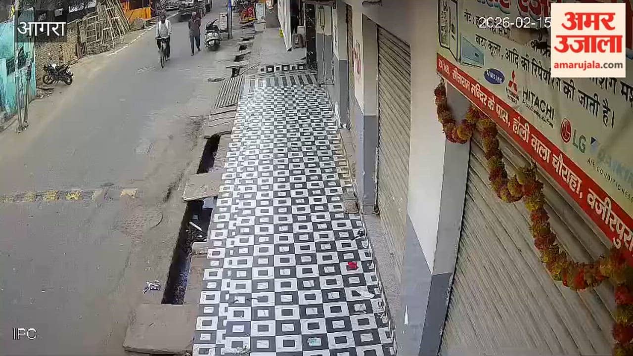 Tractor stuck in a pothole after road caved in Agra