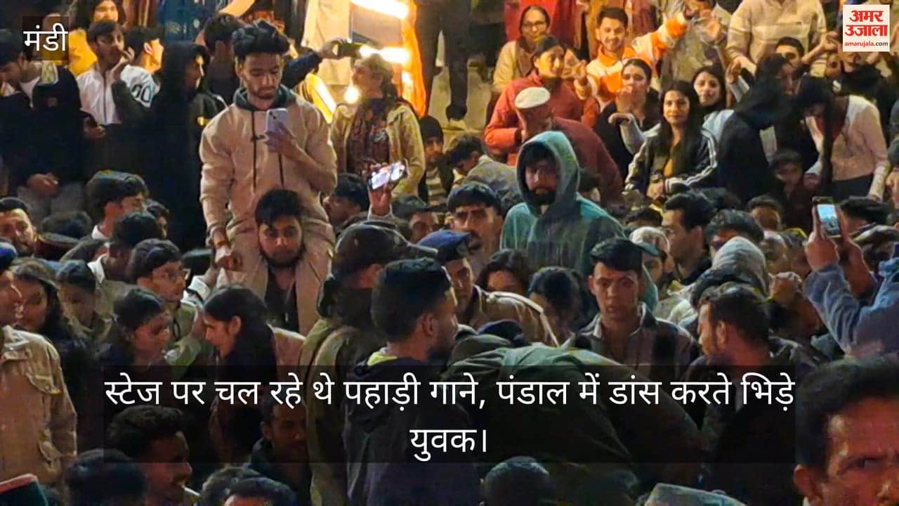 Hill songs were being played on the stage, young men clashed while dancing in the pandal