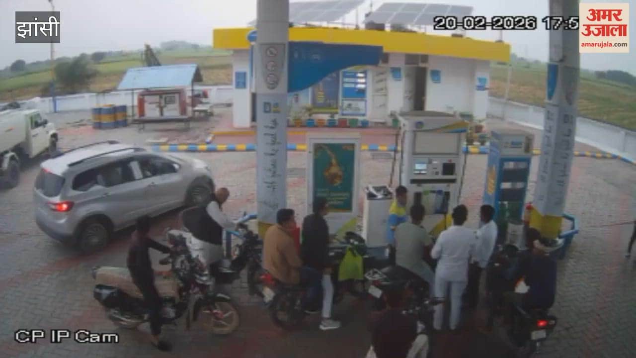 A car caught fire at a petrol pump, a major accident was averted due to the promptness of the employee.