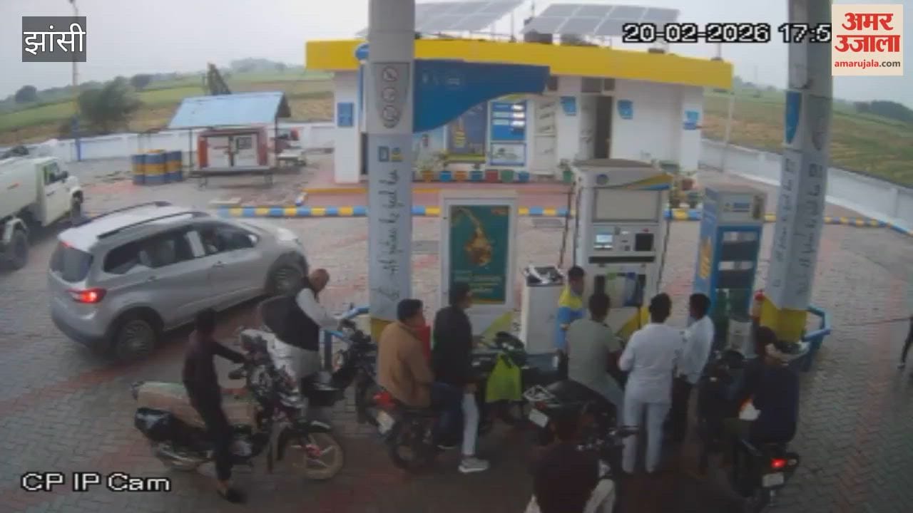 A car caught fire at a petrol pump, a major accident was averted due to the promptness of the employee.