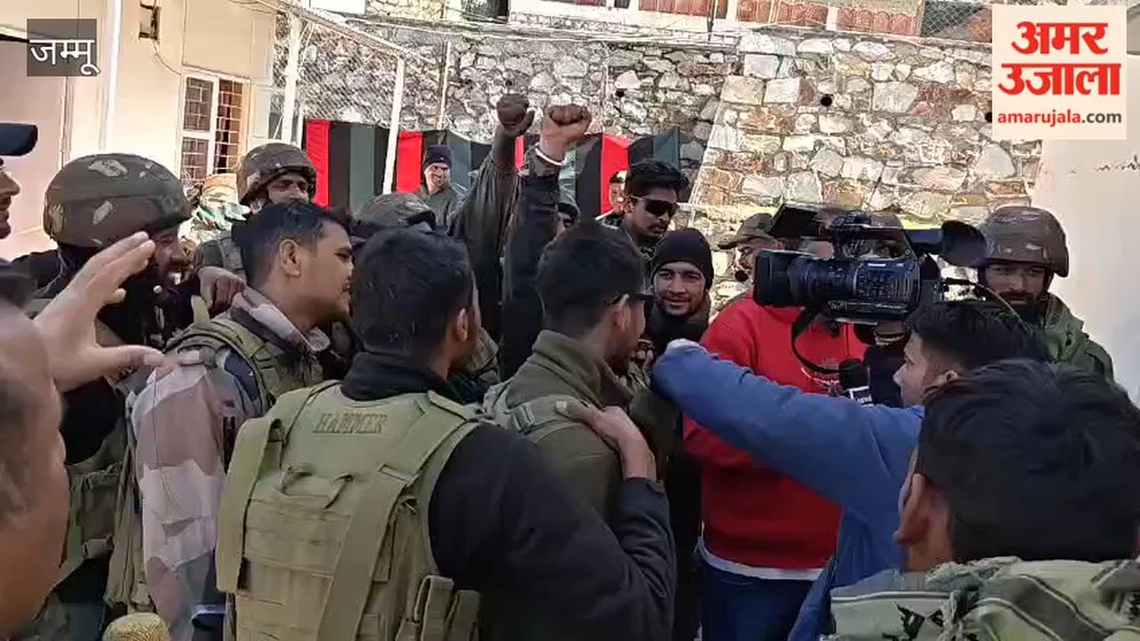 Soldiers celebrate after the success of Operation Trashi-1