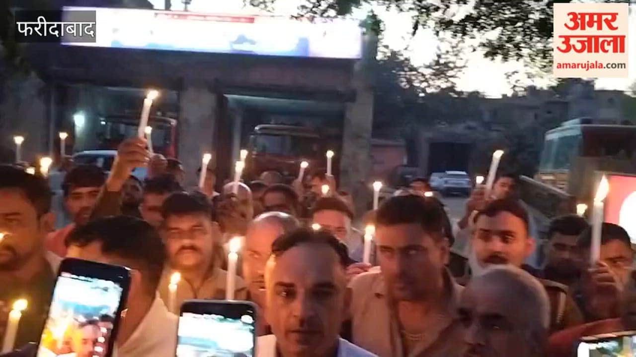 Tributes paid in candle march after death of two workers burnt in fire in Faridabad factory
