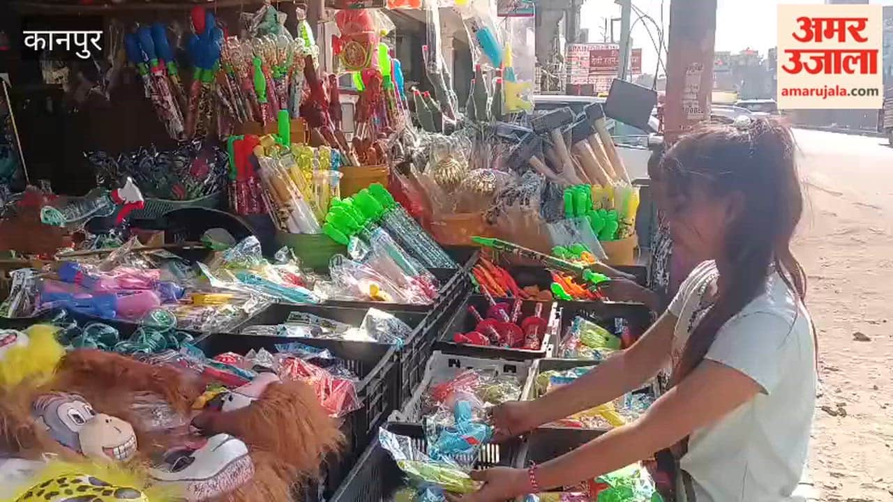 Holi festival nears, shops selling colors, gulal, and water guns are set up