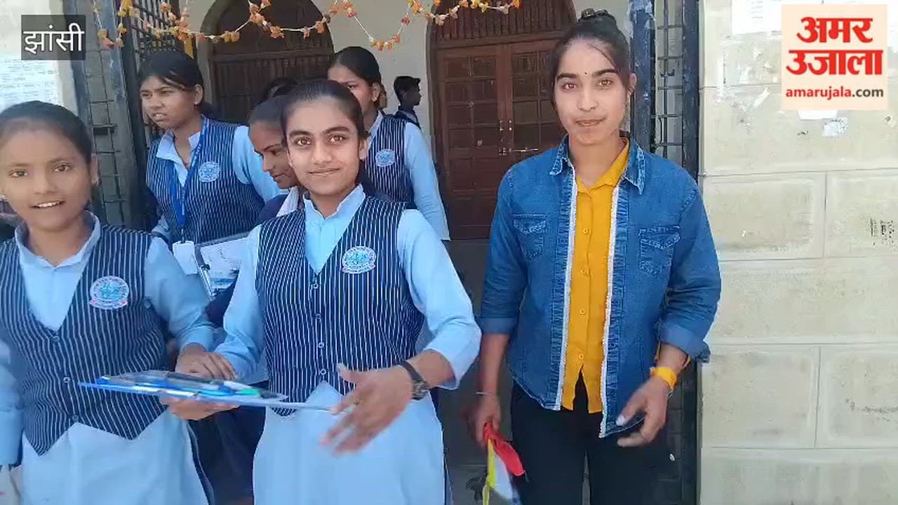 Students react after taking the UP Board high school maths exam in Jhansi.