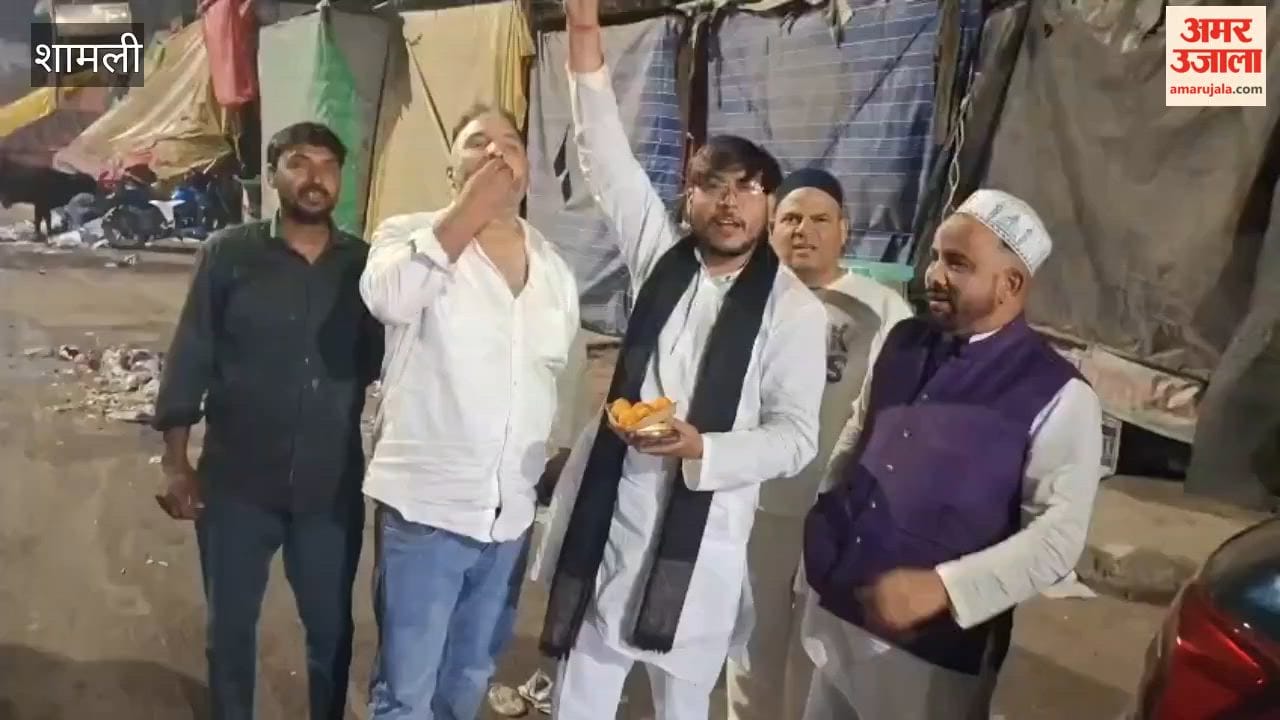 Cricket fans celebrated India's semi-final victory and distributed sweets.