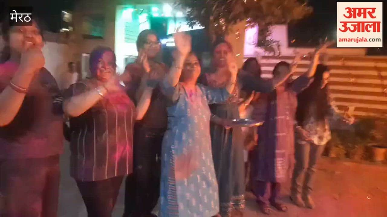 After Holika Dahan in Aaradhya Heights Colony, people celebrated Holi and danced.