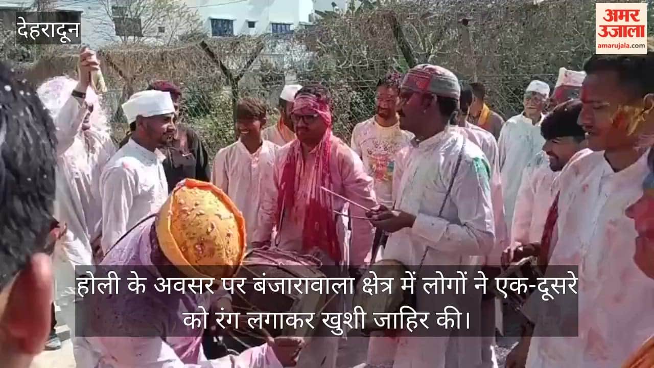 Holi celebration in Banjarawala, Holi revelers spread happiness by applying colours