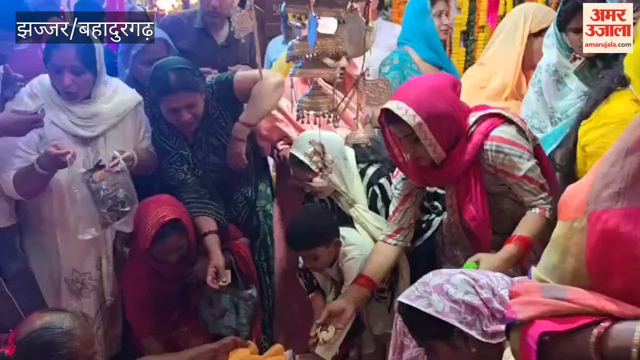 Devotees offered fans at the tomb of Baba Prasad Giri