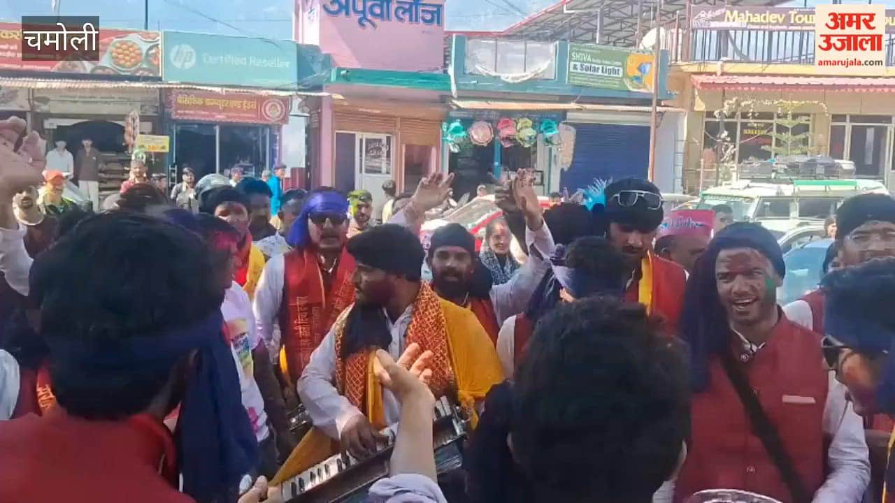 VIDEO: Sitting and standing Holi celebrations continued throughout the day at the Gopinath Temple complex