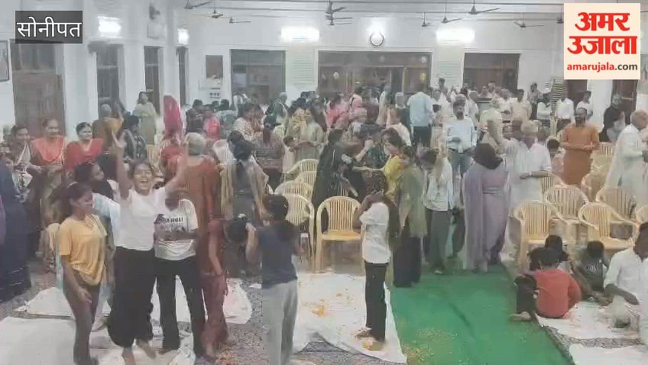 Devotees rejoice during the Arya Parivar Mangal Milan ceremony in Sonipat.