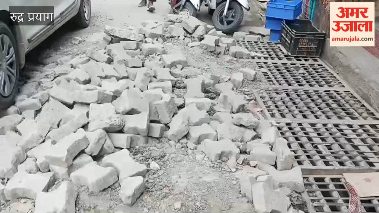 Tiles spread on the road in Agastyamuni causing traffic jam on the highway