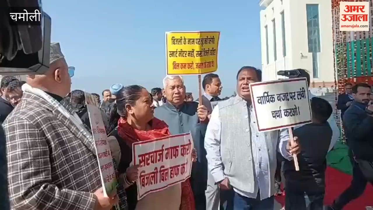 Congress MLAs protest before the start of the budget session in Gairsain