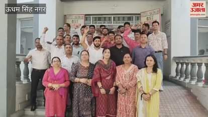 State tax workers demonstrated by tying black ribbon on their arms in rudrapur