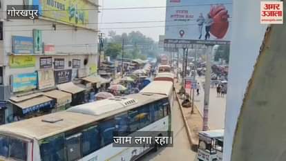Traffic jam at the railway station, long queues of buses
