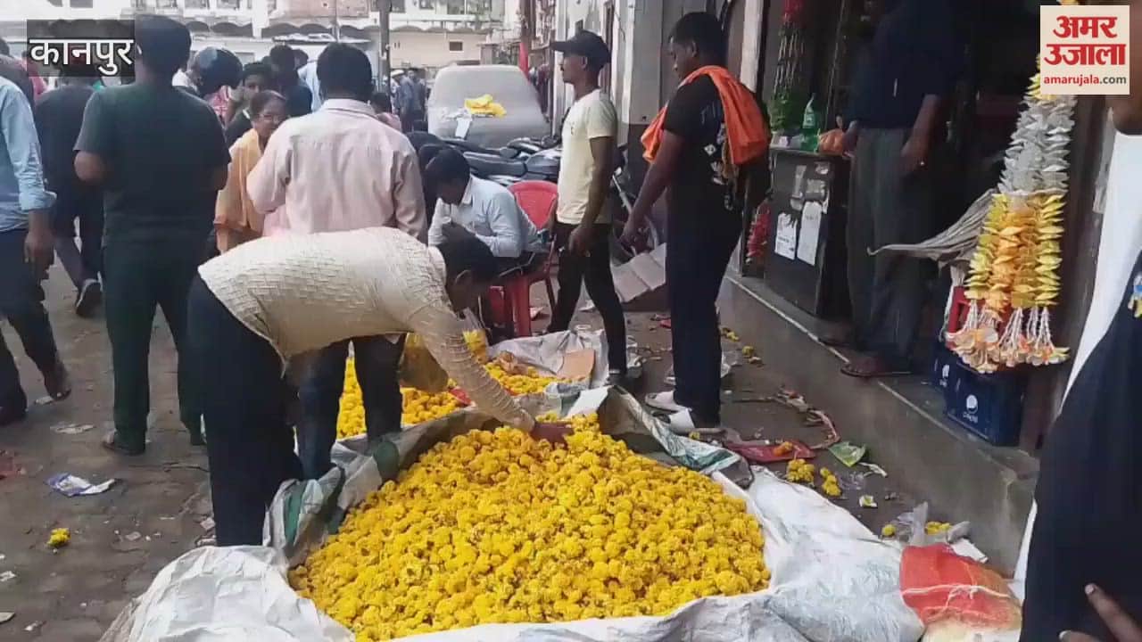 Crowds gathered at the flower market to buy puja materials and flowers